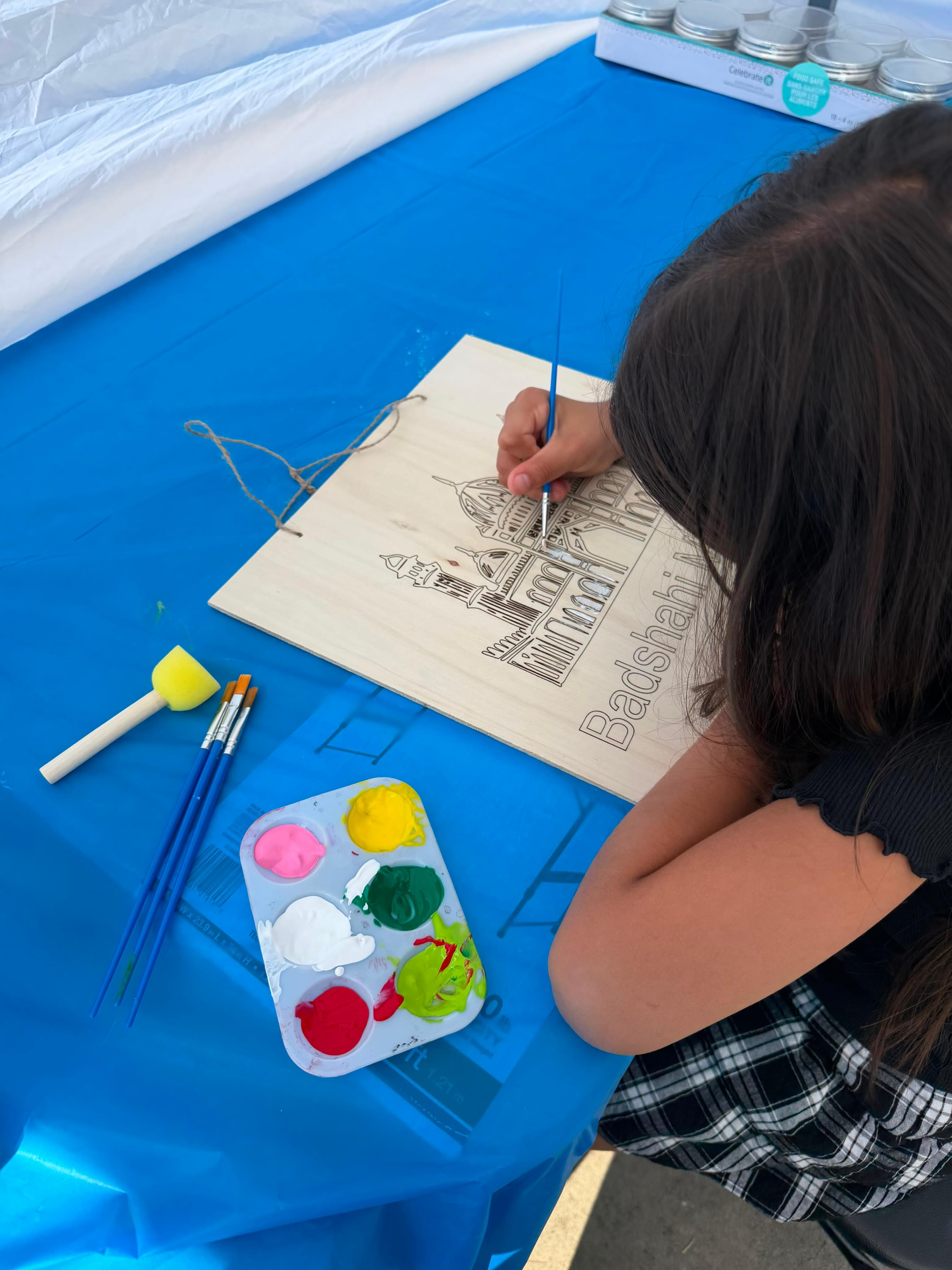 Families and kids creating together at Made By Me